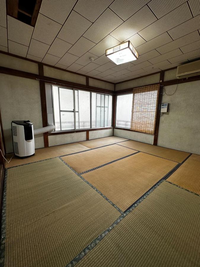 素泊まり民宿とみや Oshima Buitenkant foto