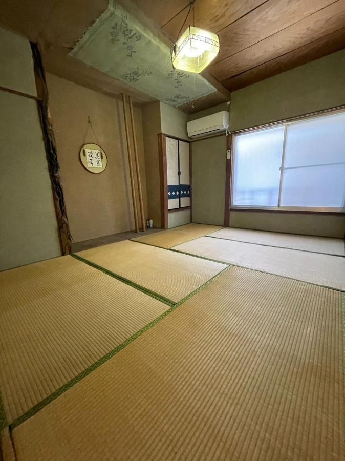 素泊まり民宿とみや Oshima Buitenkant foto
