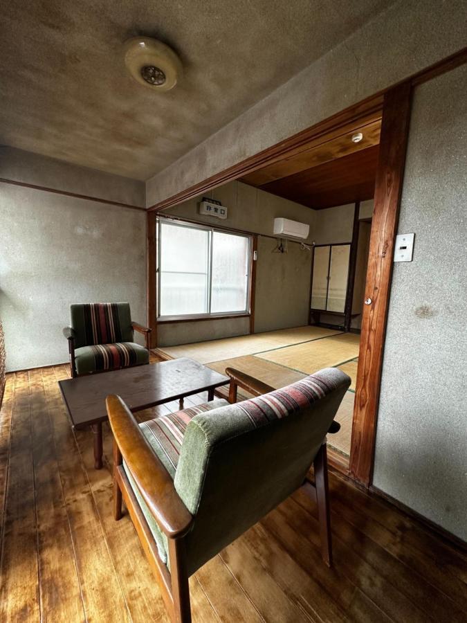 素泊まり民宿とみや Oshima Buitenkant foto
