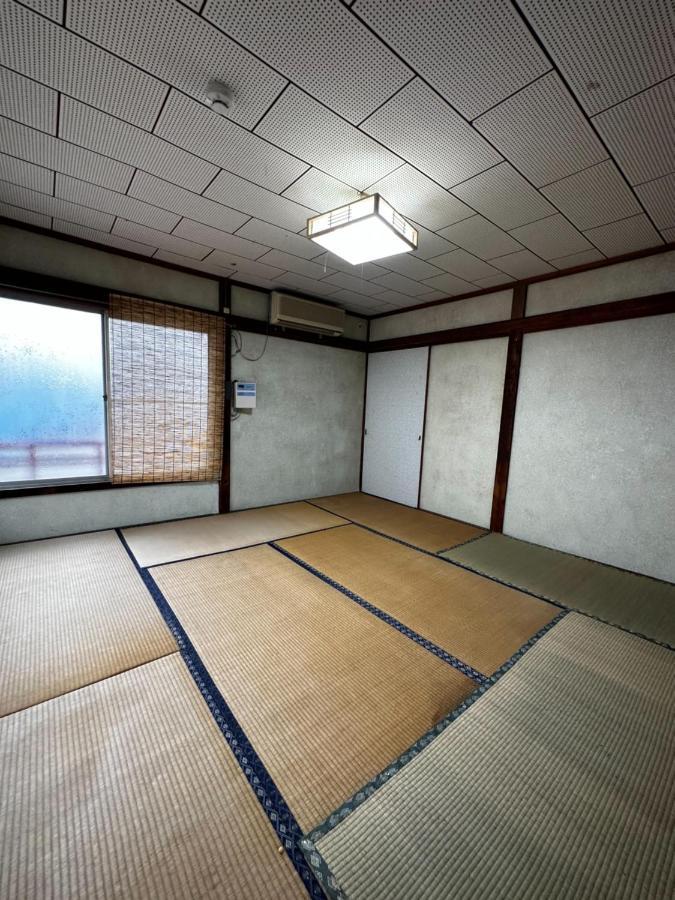 素泊まり民宿とみや Oshima Buitenkant foto