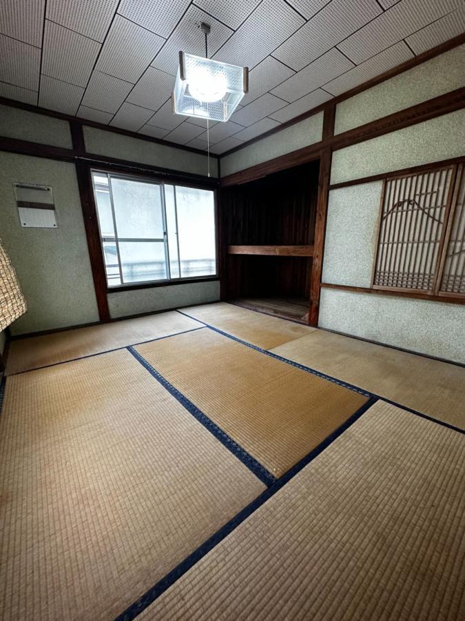 素泊まり民宿とみや Oshima Buitenkant foto